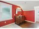 Bathroom with a vanity and two windows providing natural light at 808 N Layman Ave, Indianapolis, IN 46219