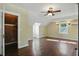Bonus room featuring natural lighting, closet, and hardwood floors at 808 N Layman Ave, Indianapolis, IN 46219
