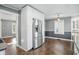 Bright kitchen featuring stainless steel appliances, white cabinets and ample space for a quaint eat-in area at 808 N Layman Ave, Indianapolis, IN 46219
