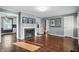 Spacious living room features hardwood floors, light gray walls, and an open floor plan at 808 N Layman Ave, Indianapolis, IN 46219