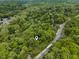 An aerial shot of a wooded property at 8310 Fall Creek Rd, Indianapolis, IN 46256