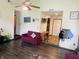 Cozy living room with hardwood floors, comfortable seating and natural light at 8318 Rob Ln, Indianapolis, IN 46237
