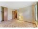 Cozy bedroom with neutral carpet, patterned walls, closet, and neutral colors at 861 Westbrook Dr, Mooresville, IN 46158