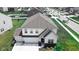 Beautiful aerial view of a home in a suburban neighborhood with lush green lawns and tree-lined streets at 8690 Lester Pl, Pendleton, IN 46064