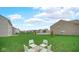 Spacious backyard with a patio and seating area, perfect for outdoor entertaining at 8690 Lester Pl, Pendleton, IN 46064