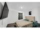 Serene bedroom with a plush headboard bed, a TV, and a soothing atmosphere at 8690 Lester Pl, Pendleton, IN 46064