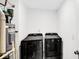 Functional laundry room includes a modern washer and dryer set at 8690 Lester Pl, Pendleton, IN 46064