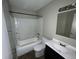 Bathroom features a standard shower-tub combo, toilet and single sink vanity at 9045 Stardust Dr, Indianapolis, IN 46229