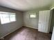 Simple bedroom with neutral walls, carpet floors, and natural light at 9045 Stardust Dr, Indianapolis, IN 46229