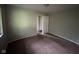 Simple bedroom with neutral walls, carpet floors, closet, and natural light at 9045 Stardust Dr, Indianapolis, IN 46229
