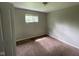 Vacant bedroom with neutral paint, standard closet and one window at 9045 Stardust Dr, Indianapolis, IN 46229