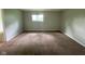 Bedroom with neutral walls, one window, and carpet flooring at 9045 Stardust Dr, Indianapolis, IN 46229