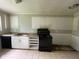 Kitchen features tile flooring and white cabinetry at 9045 Stardust Dr, Indianapolis, IN 46229