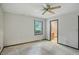 Bedroom featuring a window view and an open door to another room at 9101 Ditch Rd, Indianapolis, IN 46260