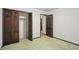 Bedroom with spacious closet and additional door with carpeted floors at 9101 Ditch Rd, Indianapolis, IN 46260