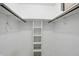 A simple closet with shelving and rods for hanging clothes at 9101 Ditch Rd, Indianapolis, IN 46260
