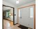 Inviting foyer featuring neutral paint and flooring leading into the home at 9101 Ditch Rd, Indianapolis, IN 46260