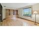 Bright room with hardwood floors, built-in shelves and a window with a view at 9101 Ditch Rd, Indianapolis, IN 46260