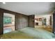 Living room showing transition to kitchen and another room, highlighting the home's layout at 9101 Ditch Rd, Indianapolis, IN 46260