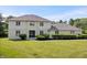 Charming two-story home boasts a well-manicured lawn, mature landscaping, and a welcoming front entrance at 9205 Selkirk Ct, Indianapolis, IN 46260