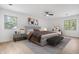 Cozy main bedroom with a queen bed, nightstands, and a ceiling fan at 9205 Selkirk Ct, Indianapolis, IN 46260
