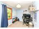 Bedroom featuring a workstation, window, and shelf at 9402 Thornwood Dr, Indianapolis, IN 46250