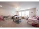 Spacious bedroom with two beds, lots of toys, and carpeted flooring, perfect for playtime and relaxation at 9671 Holborn Ave, McCordsville, IN 46055