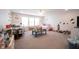 Spacious bedroom with two beds, lots of toys, and carpeted flooring, perfect for playtime and relaxation at 9671 Holborn Ave, McCordsville, IN 46055