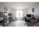 Bright home office with natural light, floral wallpaper, and stylish decor at 9671 Holborn Ave, McCordsville, IN 46055