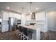 Beautiful kitchen features stainless steel appliances, a large island, and stylish cabinetry with granite countertops at 9671 Holborn Ave, McCordsville, IN 46055