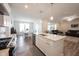 Spacious open concept featuring kitchen, dining, and living areas creates an ideal space for entertaining and Gathering gatherings at 9671 Holborn Ave, McCordsville, IN 46055