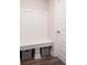 Mudroom featuring a white bench with storage cubbies and white trim at 9671 Holborn Ave, McCordsville, IN 46055