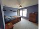 Bedroom with ceiling fan, carpet, and a theme at 10042 Pine Grove Way, Indianapolis, IN 46234