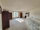 Bonus room featuring built in shelves, desk and large window for natural light at 10042 Pine Grove Way, Indianapolis, IN 46234