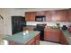 Modern kitchen with stainless steel appliances, and an island at 10042 Pine Grove Way, Indianapolis, IN 46234