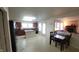 Eat-in kitchen with wood cabinets, kitchen island and stainless steel refrigerator at 10042 Pine Grove Way, Indianapolis, IN 46234