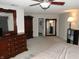 Main bedroom with full furnishings, neutral colors and ensuite bath at 10042 Pine Grove Way, Indianapolis, IN 46234