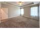 Bedroom featuring neutral-colored walls and carpet, a ceiling fan, and great natural light at 1019 White Oak Dr, Plainfield, IN 46168