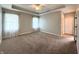 Spacious main bedroom with large windows and neutral carpet and paint at 1019 White Oak Dr, Plainfield, IN 46168