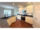 Well-equipped kitchen with stainless steel appliances, ample cabinetry, and center island at 1019 White Oak Dr, Plainfield, IN 46168