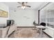 Office featuring hardwood floors, a ceiling fan, and desk with computer at 10215 Lauren Pass, Fishers, IN 46037