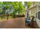 Relax on your spacious outdoor back deck surrounded by beautiful mature trees for privacy at 10216 Hatherley Way, Fishers, IN 46037