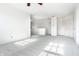 Bonus room featuring neutral carpeting and natural light at 10216 Hatherley Way, Fishers, IN 46037