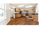 Spacious kitchen boasting wooden cabinets, stainless steel appliances, and plenty of counter space at 10216 Hatherley Way, Fishers, IN 46037
