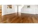 Hardwood floors run throughout this spacious living room with an open floorplan at 10216 Hatherley Way, Fishers, IN 46037