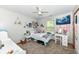 Cozy bedroom featuring natural light, comfortable carpeting, and soft furnishings at 1031 W Morning Walk Dr, Greenfield, IN 46140