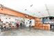 Spacious garage featuring a bar, workbench, storage, tools, bikes, high ceilings, and ample space at 1031 W Morning Walk Dr, Greenfield, IN 46140