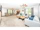 Spacious living room with fireplace, neutral decor, and plenty of natural light at 1031 W Morning Walk Dr, Greenfield, IN 46140