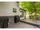 Outdoor deck featuring a grill, seating area, and sliding glass doors to the home at 10380 Sand Creek Blvd, Fishers, IN 46037