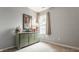 The bedroom features a green dresser next to a window at 10380 Sand Creek Blvd, Fishers, IN 46037